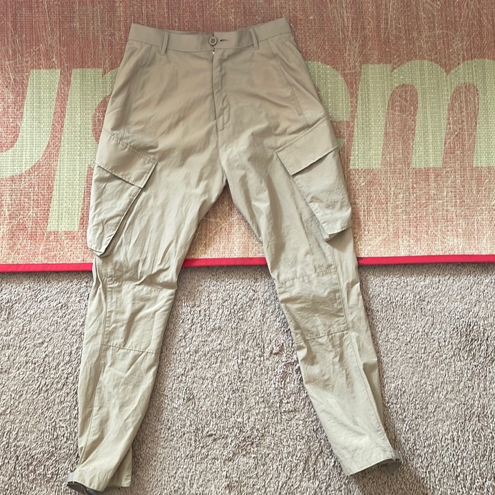 GIVENCHY beige, tapered cargo pants.